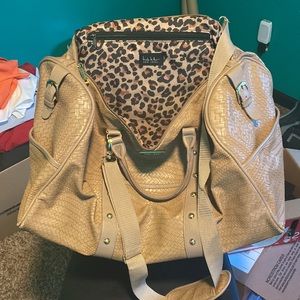 Tan woven duffle bag, gold hardware